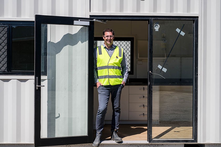 Royal Wolf Business Development Manager (Tasmania) is proud to be part of the project helping to house those who need it most. Photo: Alastair Bett